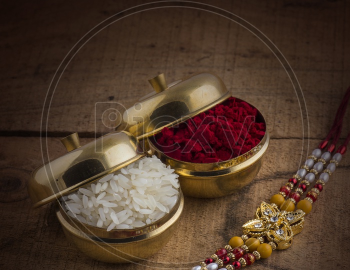 Elegant Raakhi With Kumkum and Rice Grains  For Raksha Bandhan Festival