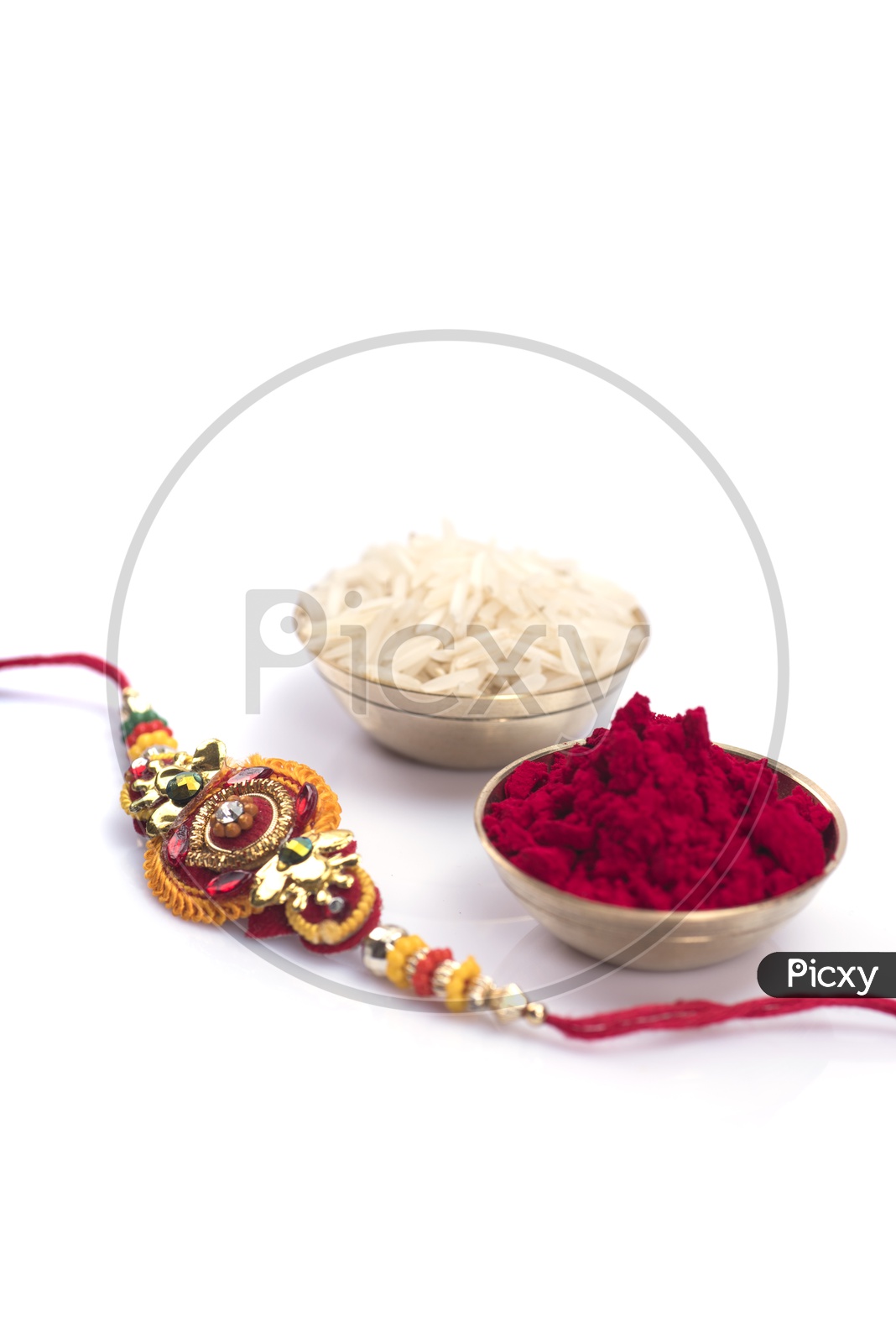 Elegant Raakhi With Rice Grains and  Kumkum  For Raksha Bandhan Festival