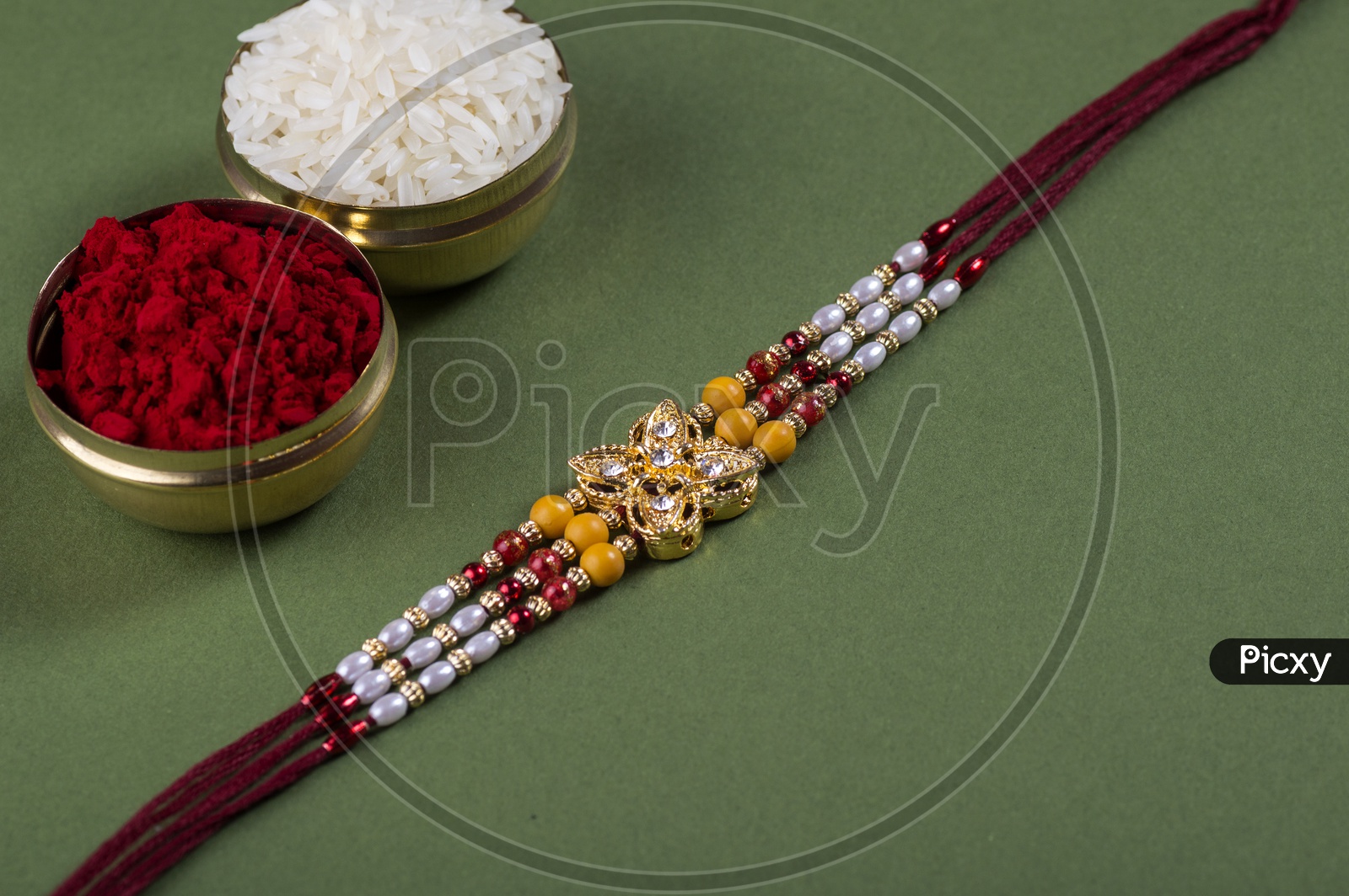 Template of Elegant  Raakhi With Rice Grains And  Kumkum For Raksha Bandhan Festival  Wishes