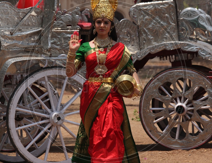 A Young Indian Girl In Hindu Goddess Lakshmi Devi Getup