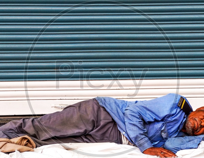 Security guard Sleeping on Streets