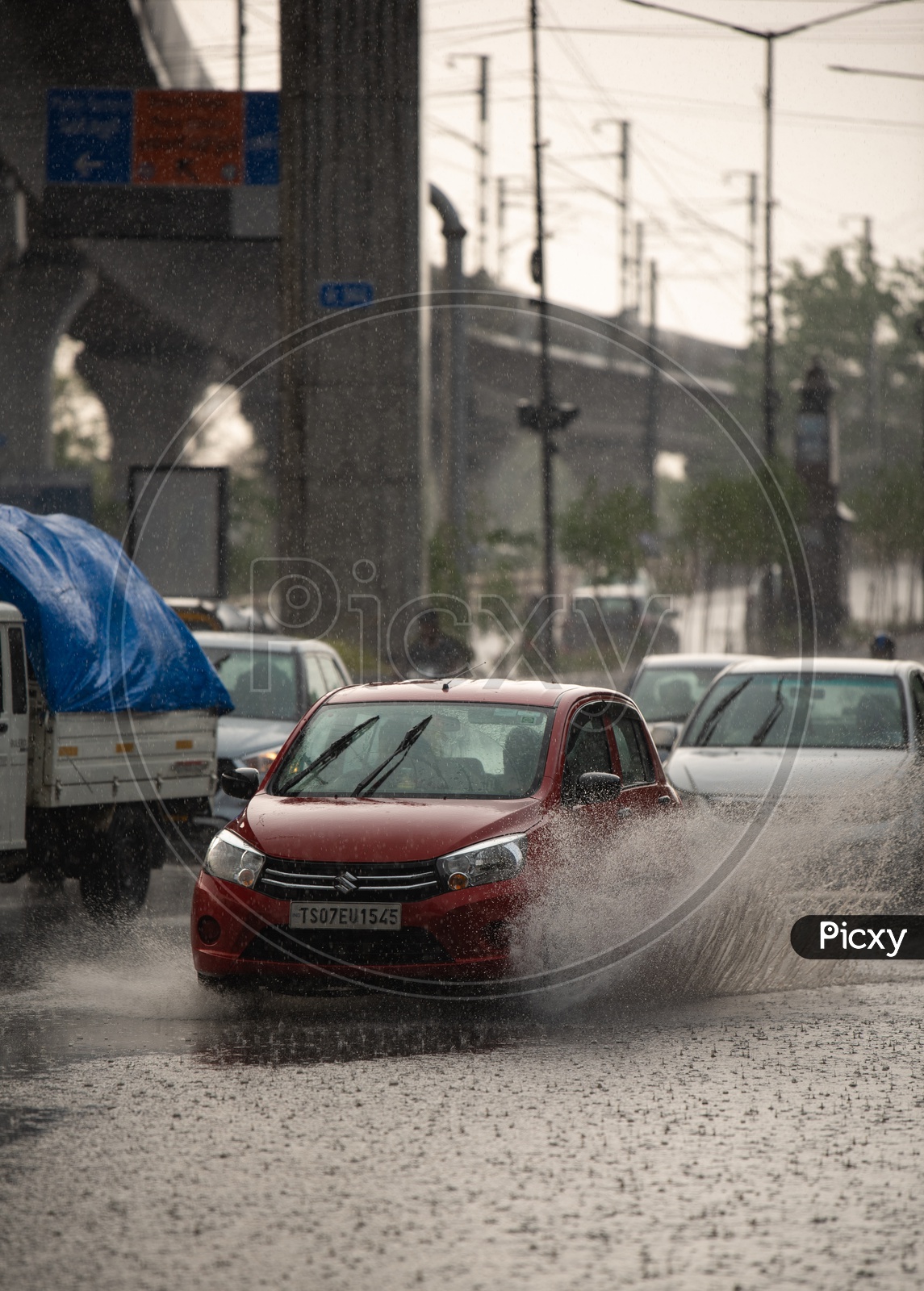 Cars On the Flooded City Roads In a Rainy Day