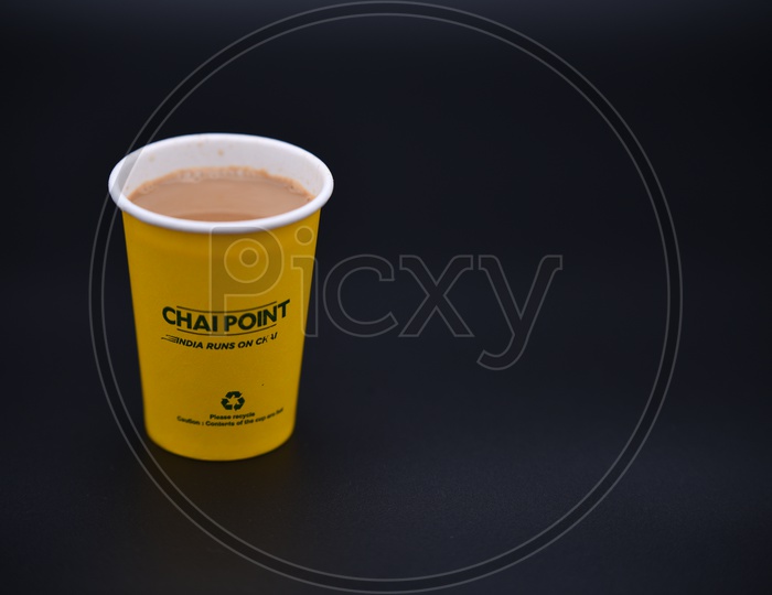 Chai Point  Paper Tea Cup On an Isolated Black Background