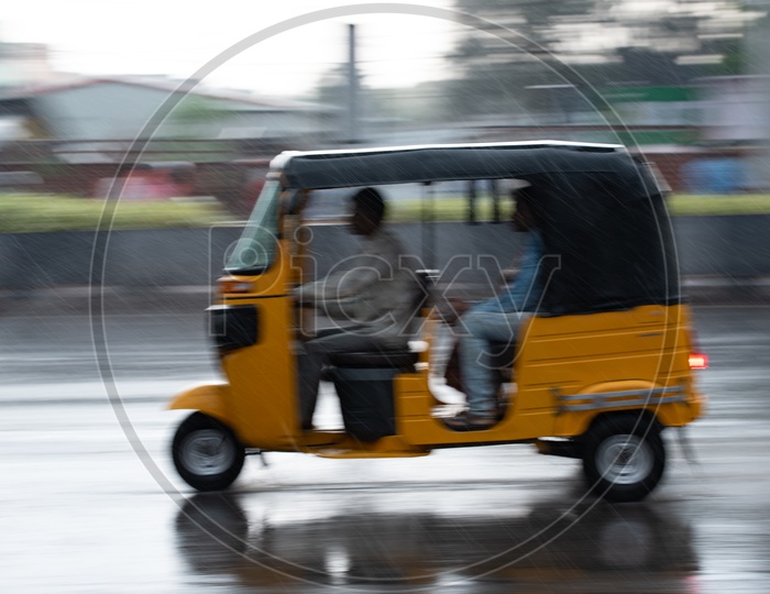 An Auto On the Roads in Rain