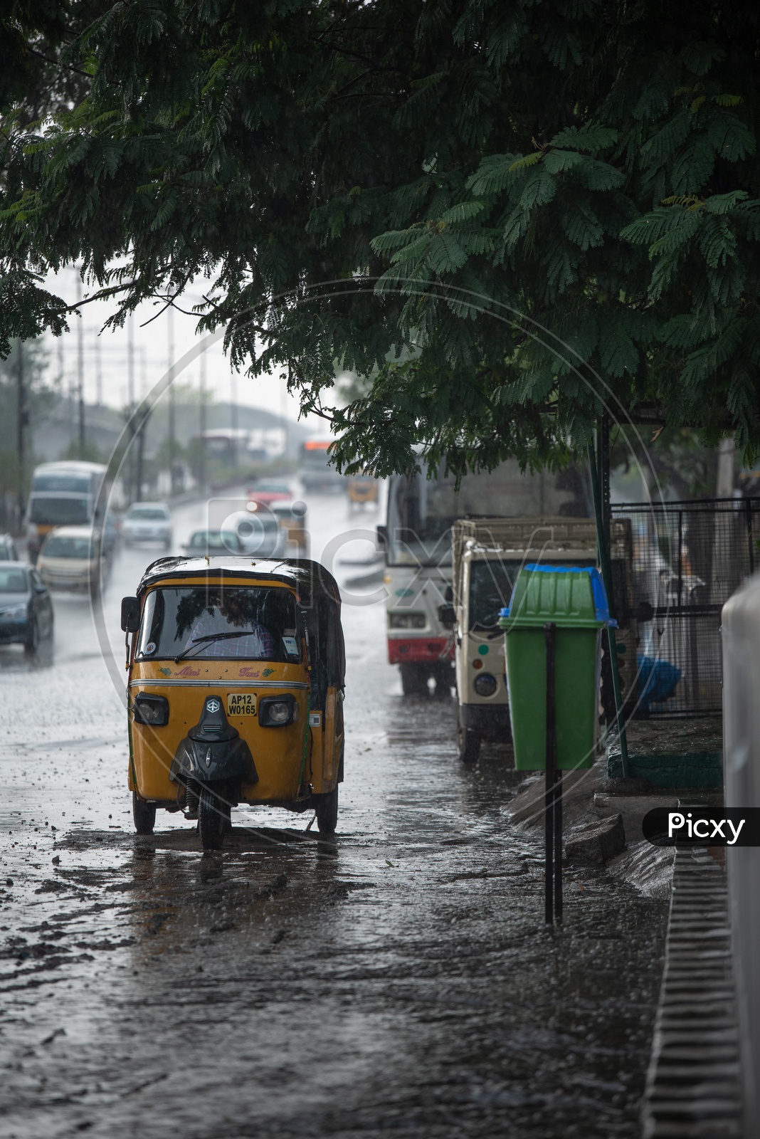 Autos On the Flooded City Roads In a Rainy Day