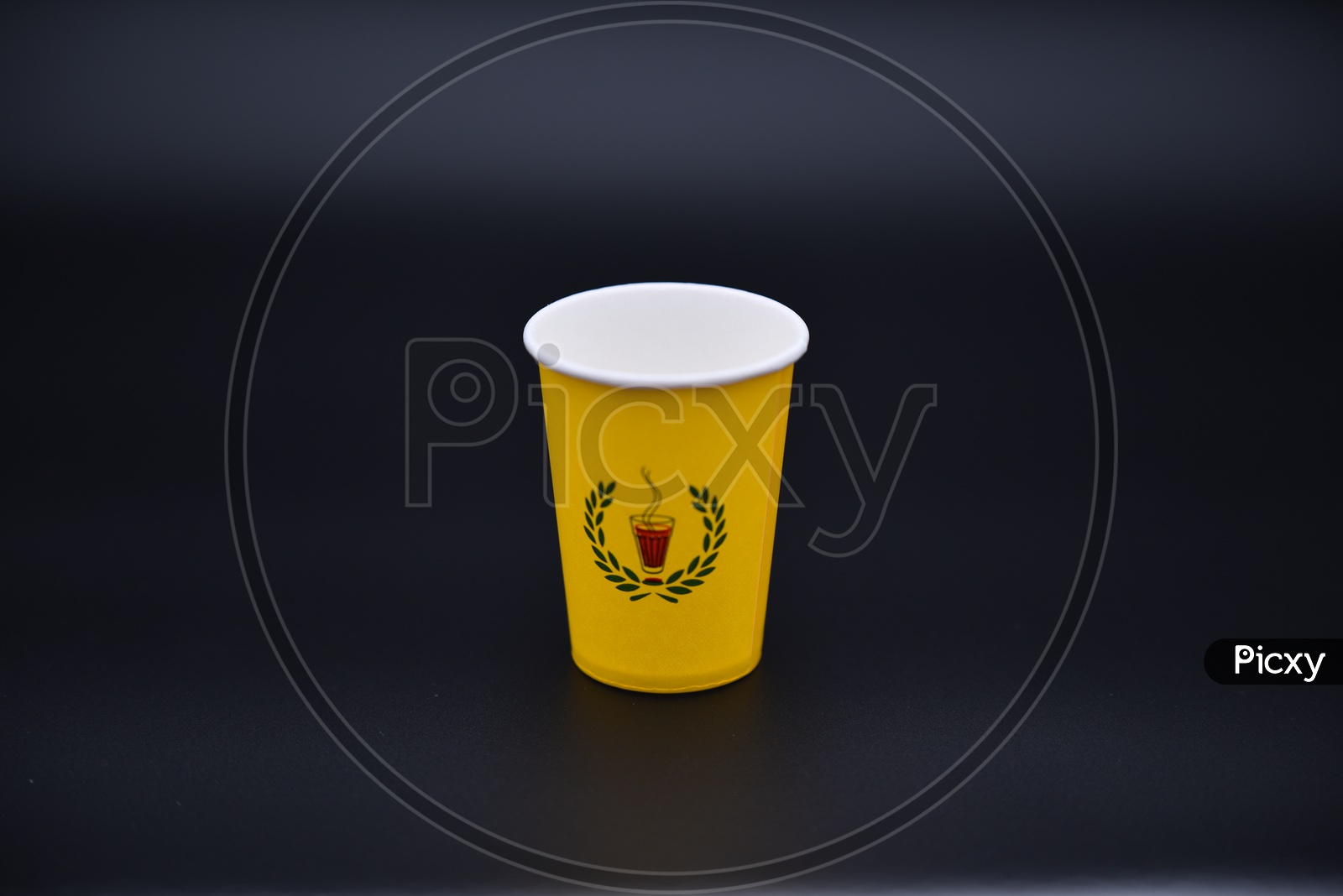 Chai Point Paper Tea Cup On an Isolated Black Background