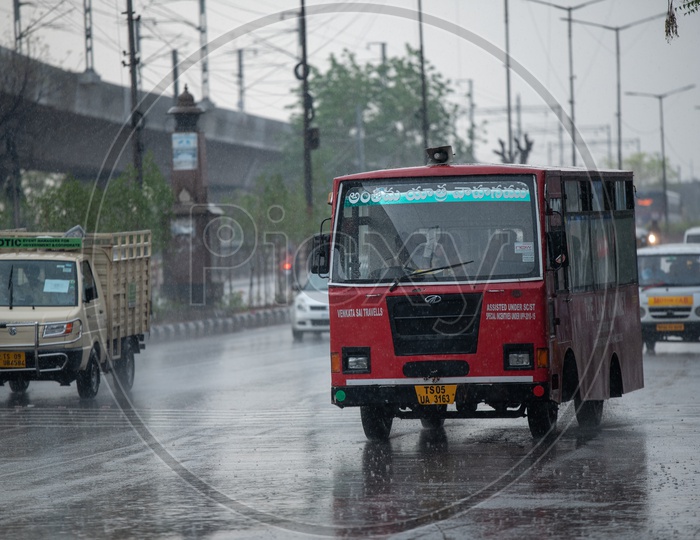 Hindu Funeral Vehicle On  Roads in a Rainy Day