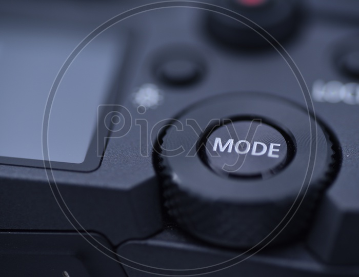 MODE Button in Cannon EOS R  DSLR Camera