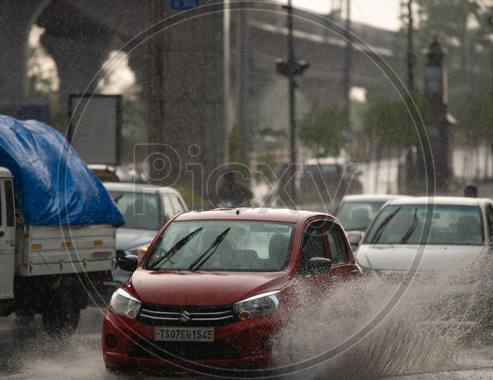 Cars On the Flooded City Roads In a Rainy Day