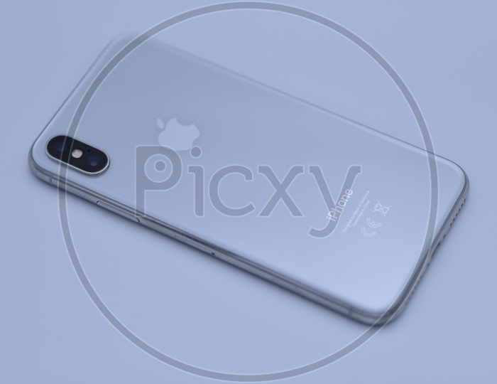 IPhone X  Backside Panel View On An Isolated White Background