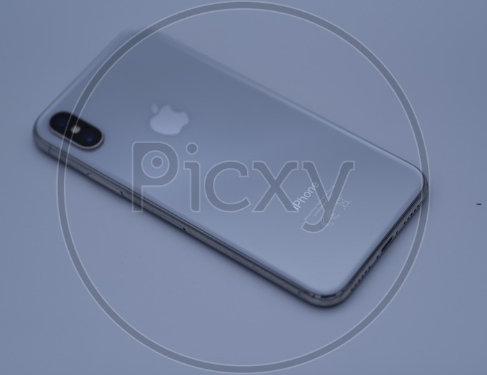 IPhone X  Backside Panel View On An Isolated White Background