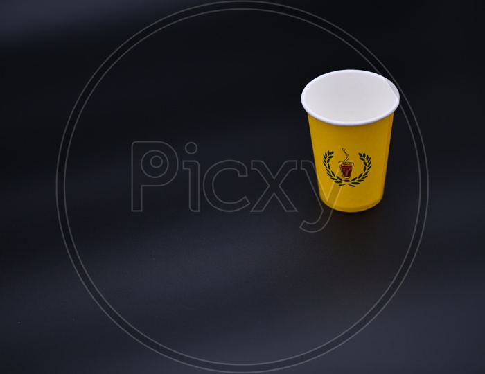 Chai Point Paper Tea Cup On an Isolated Black Background