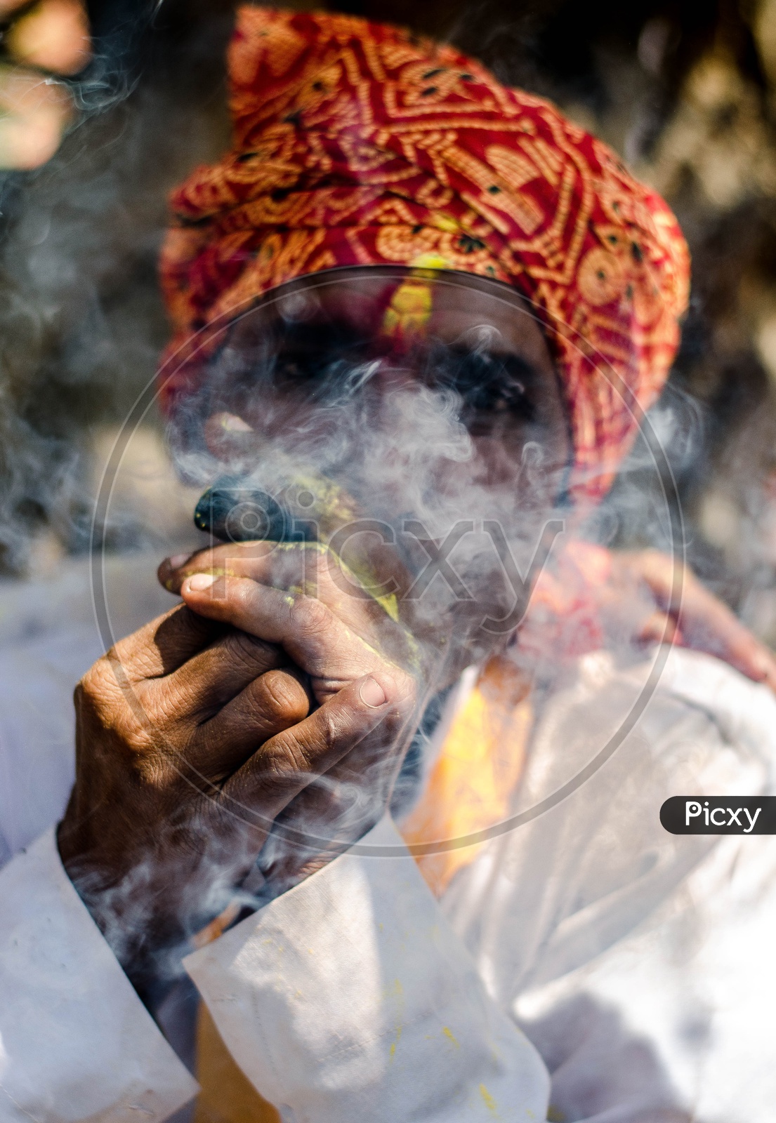 Indian Hindu Sadhu Or Baba  Smoking Ganja Or Weed