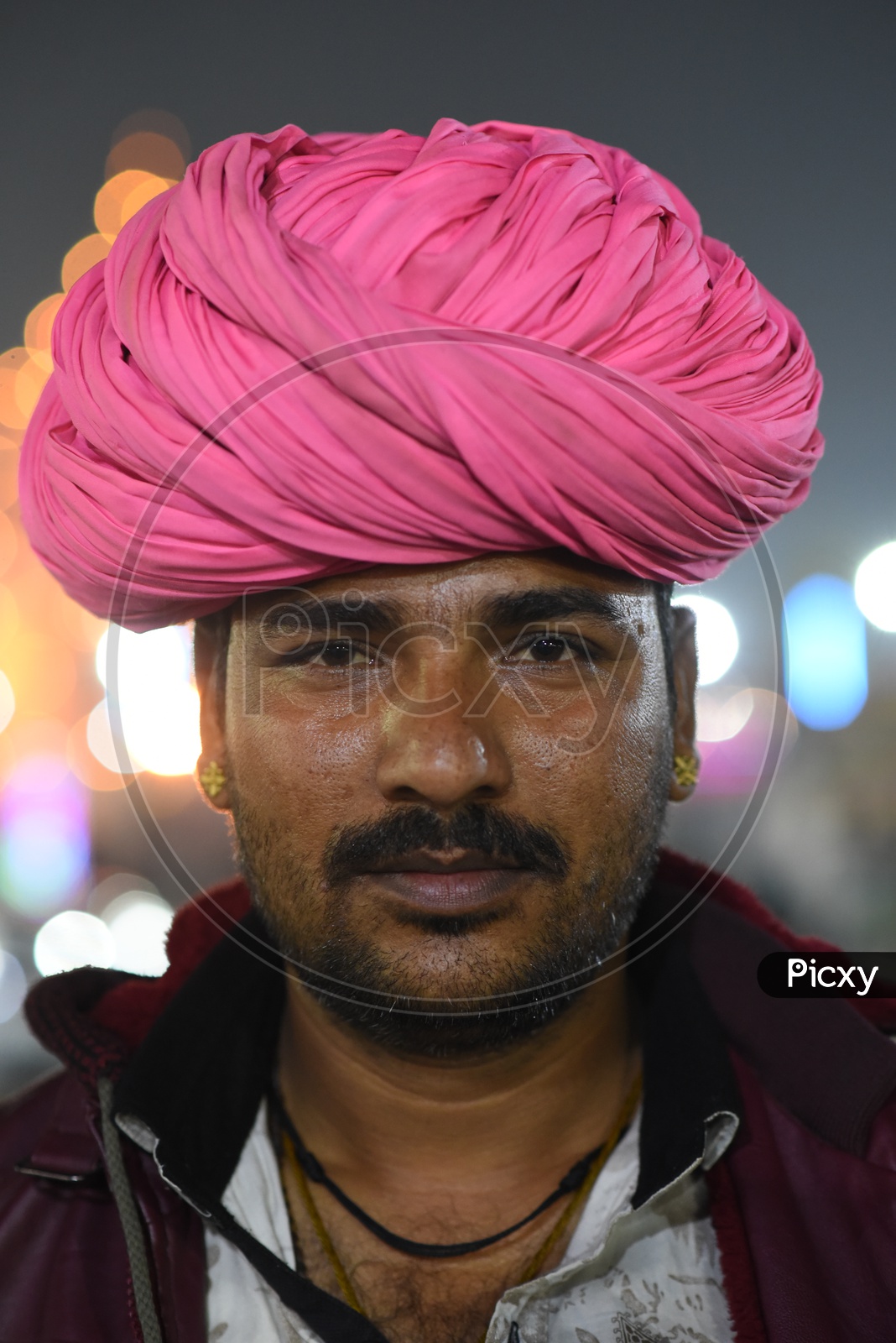 Portrait of an Indian man with pink turban
