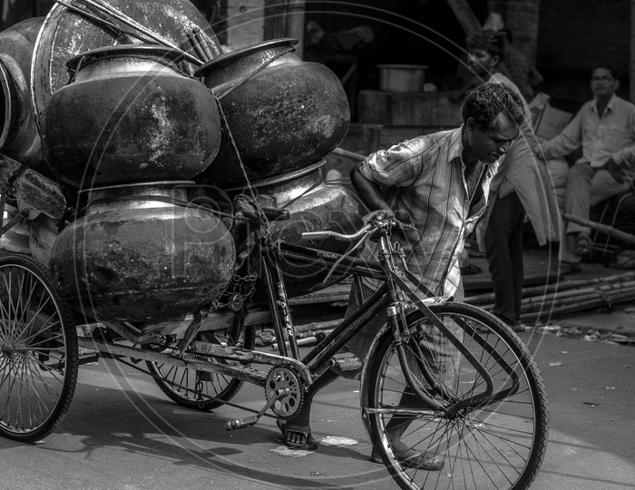 A Rickshaw Puller Pulling The Heavy Goods On the Streets Of India