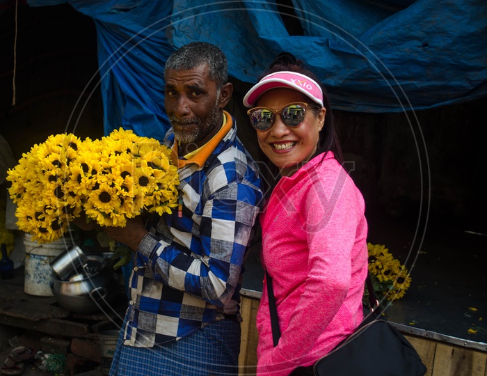 A Street Vendor Selling Pale Leafed Sunflower