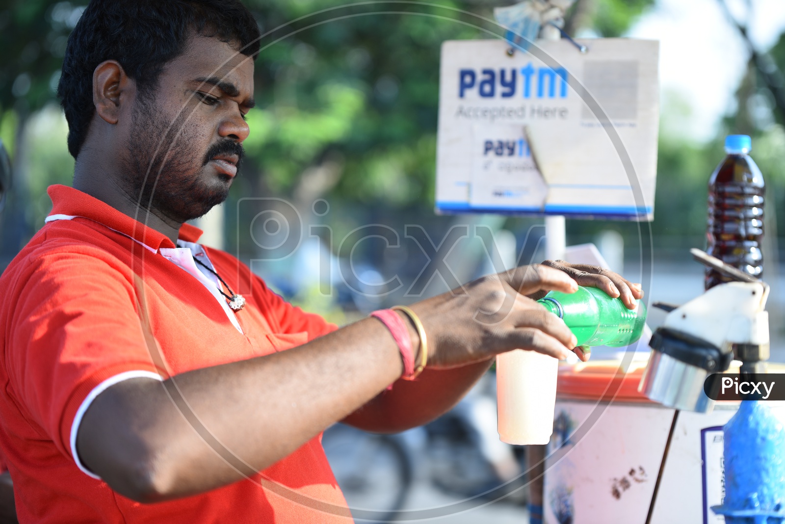 Street Vendor Preparing Lemon Soda At Roadside Stall