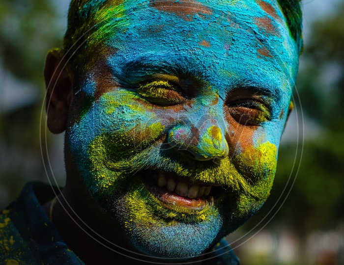 An Indian Man Filled In Holi Colors