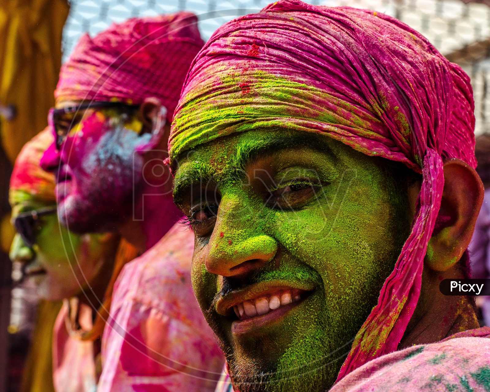 Locals People Filled In Colors At Lathmar Holi Celebrations