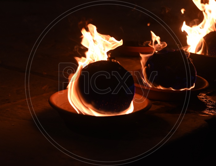 Indian Hindu Devotees Burn Camphor  ( Aarthi Plate )  At Temple Premises