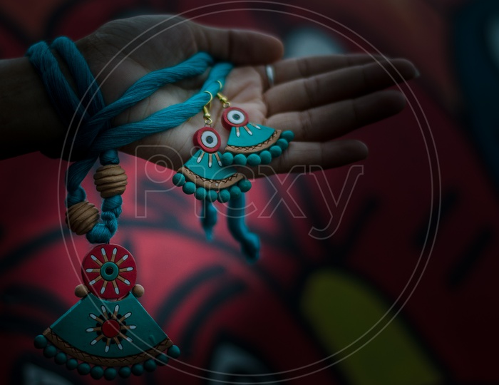 Handmade Jewellery in a Woman Hand