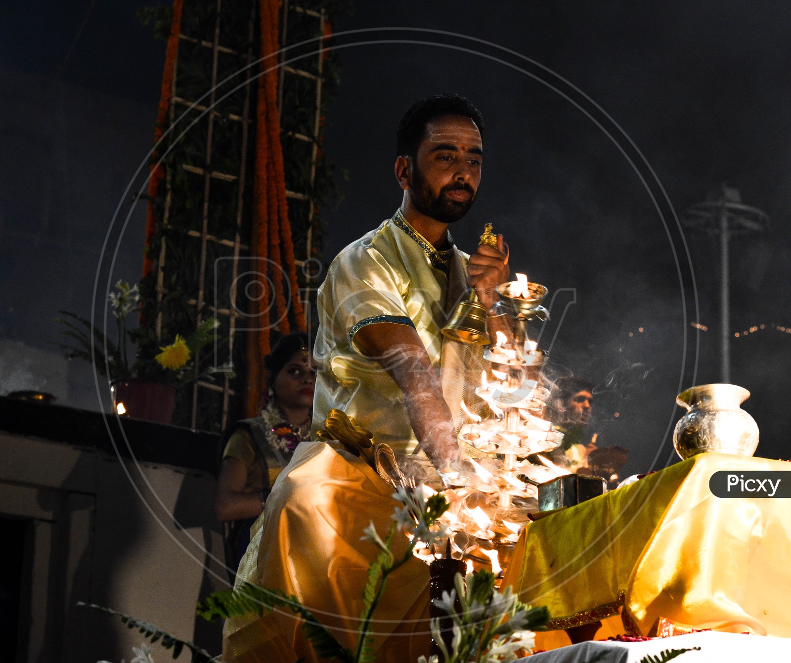 Priests Performing Ganga Haarathi Or Aarthi