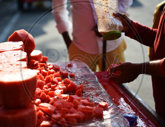 Street Vendor Stalls Of Watermelon Pieces at Roadsides for Summer