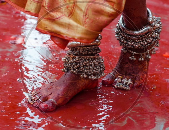 Indian Traditional Woman Wearing Anklets On Legs In Lathmar Holi