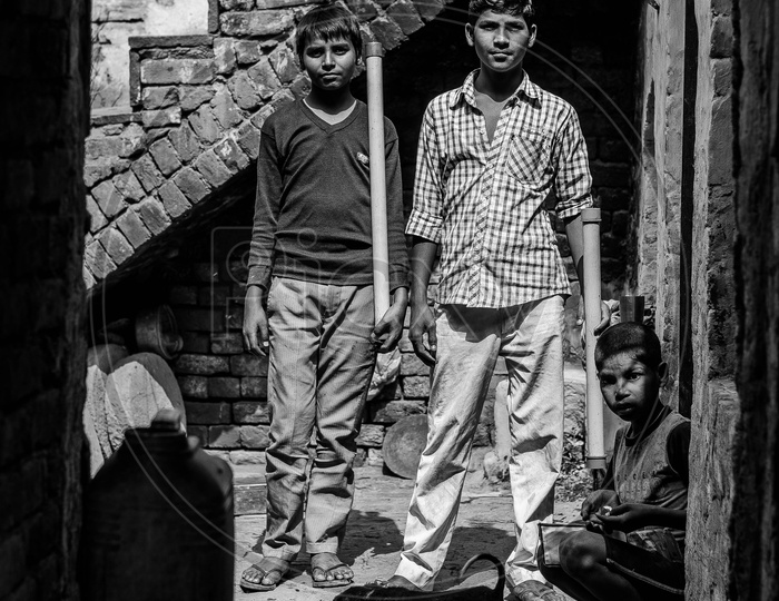 Young Indian Boys In Rural Village Home