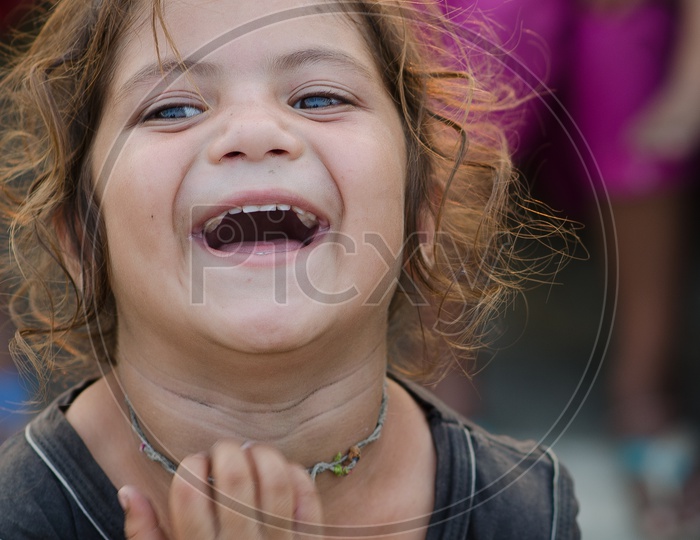 Portrait Of a Young Girl Child Laughing