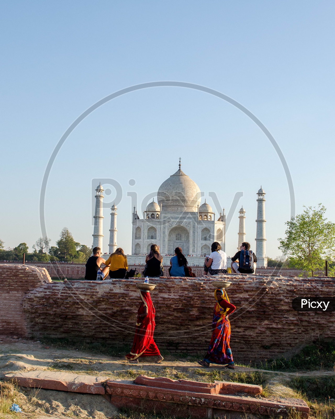 Visitors And Locals At Taj Mahal