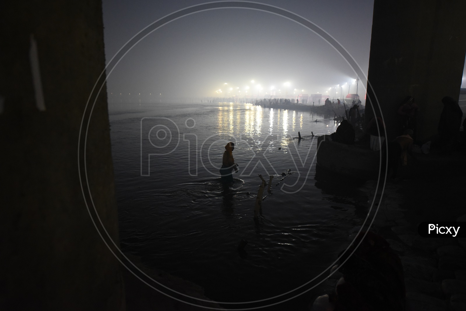 Indian Devotees Taking Holy Bath in River