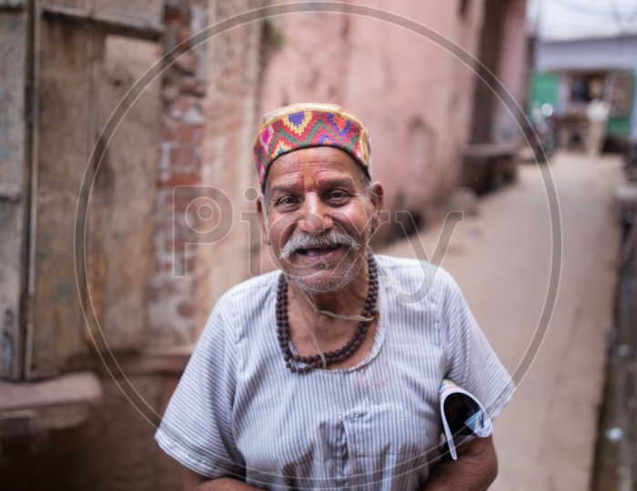 Portrait Of an Old Man In Native Attire In Barsana