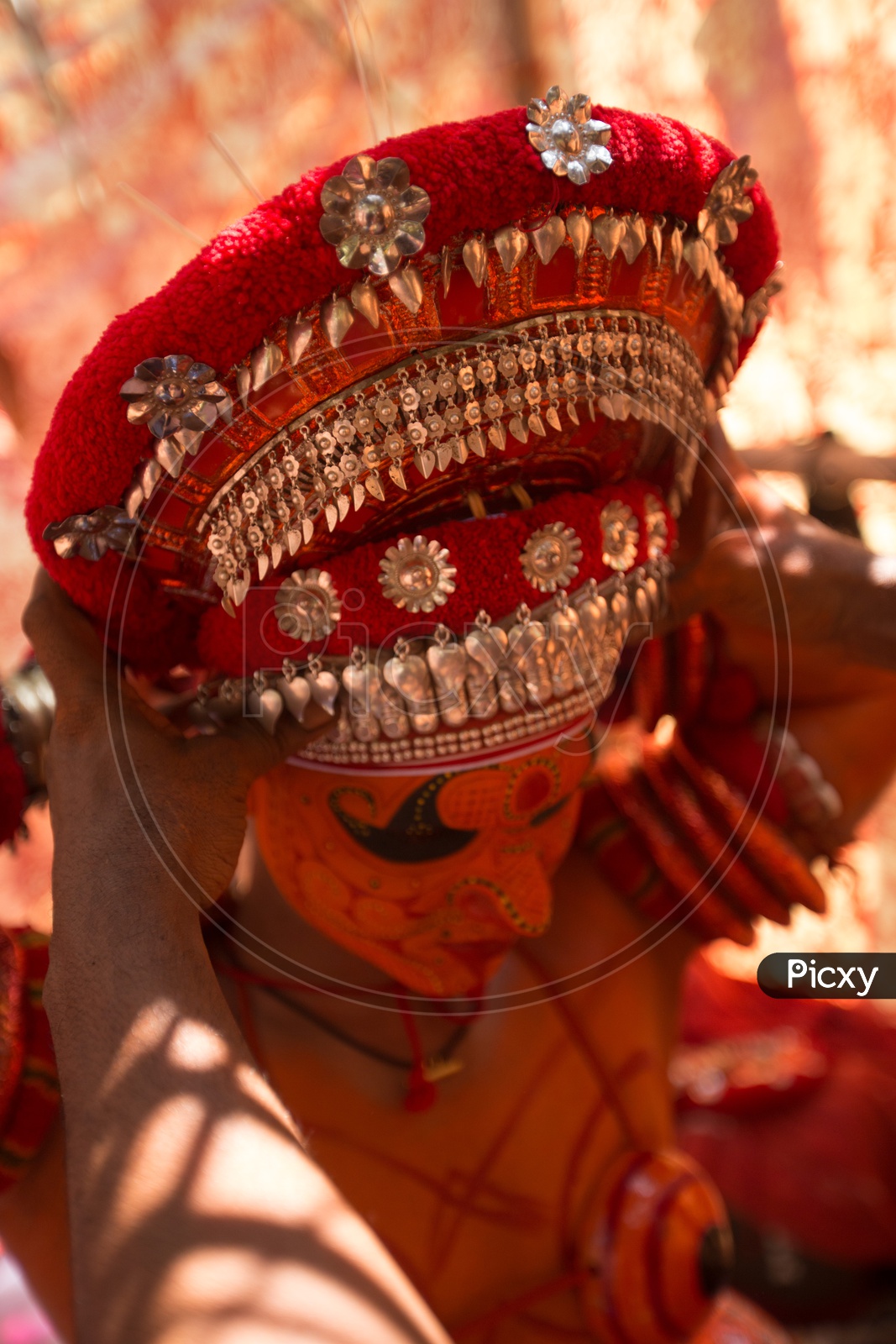 Theyyam artist getting ready for Theyyam Festival