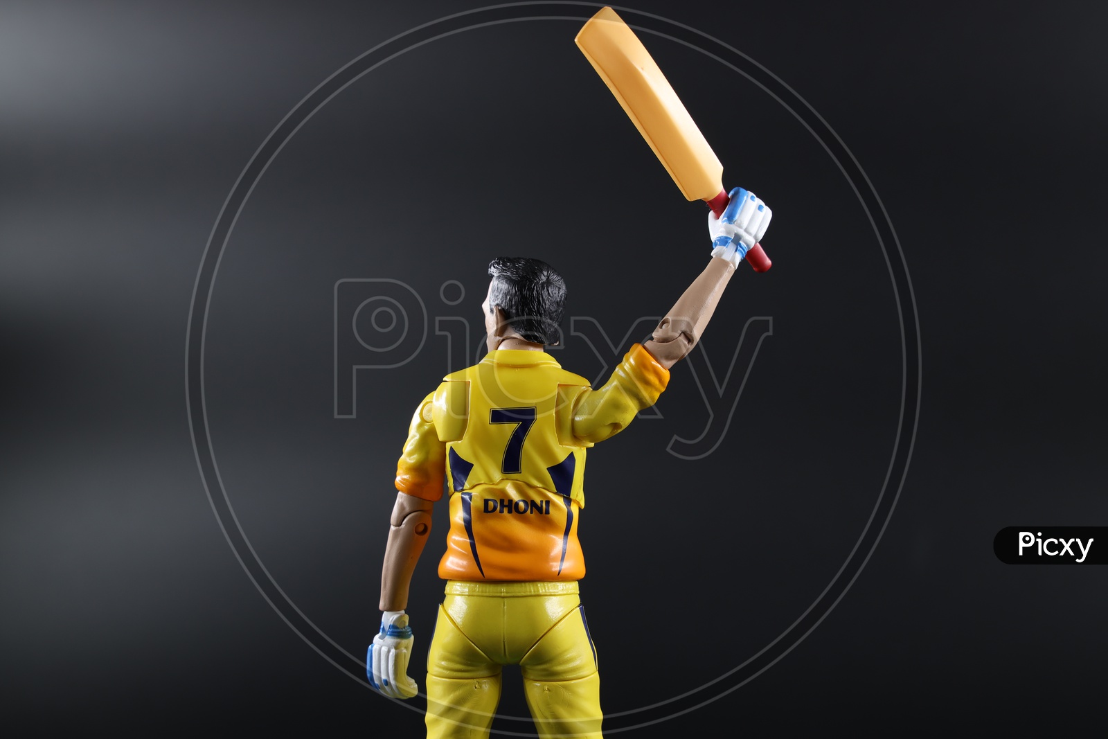 MS Dhoni  in CSK Jersey  Action Figure  or Toy  On an Isolated Black Background