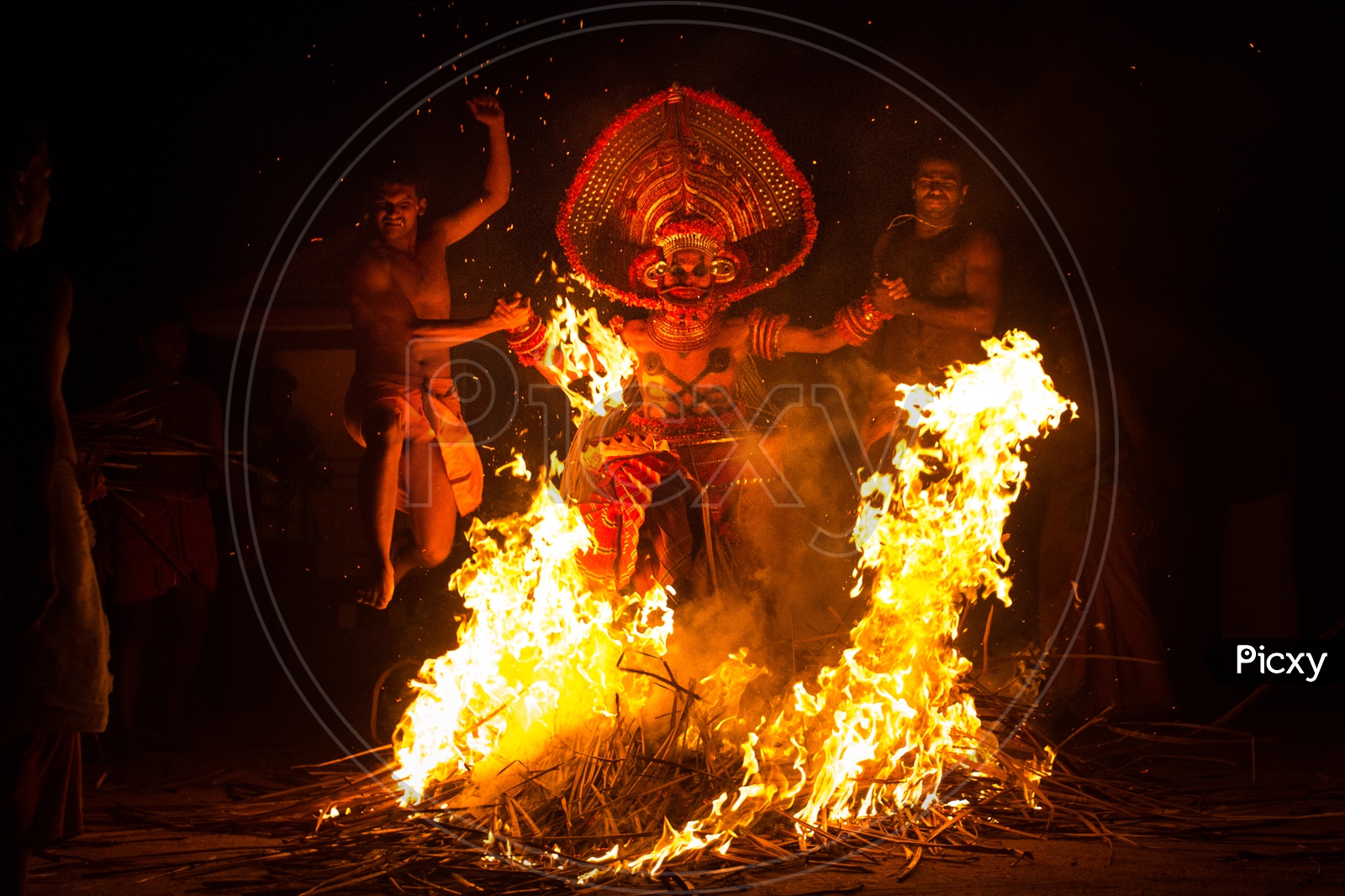 Artist performing Kalaripayattu during theyyam