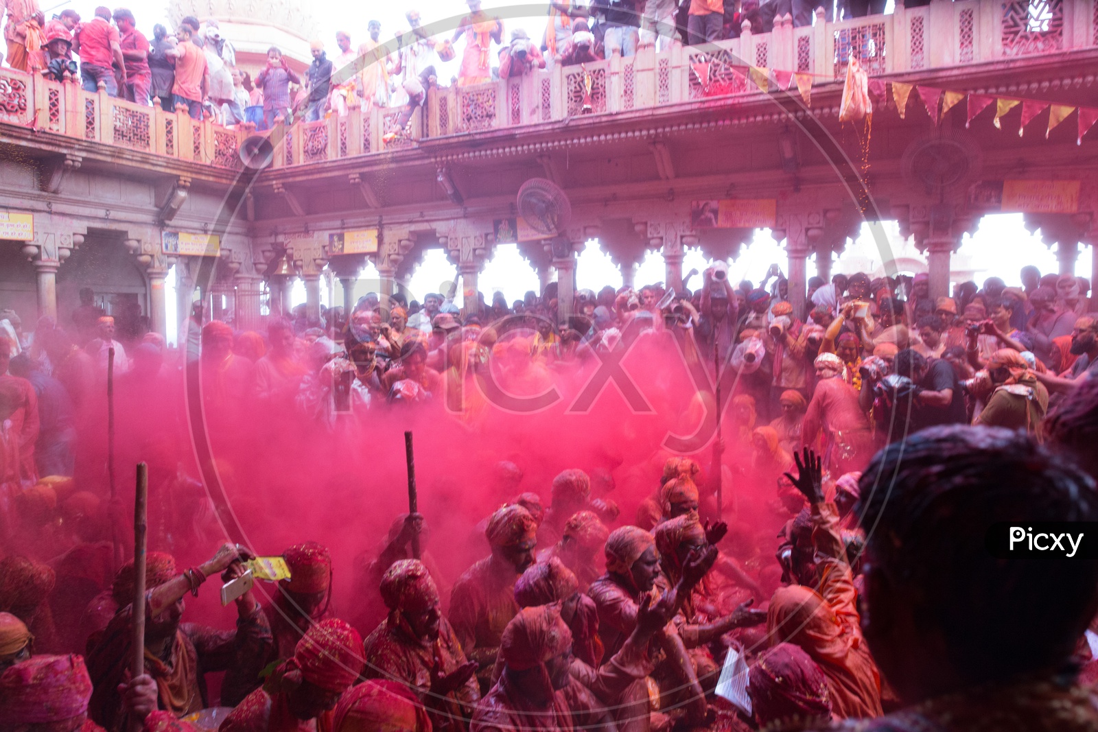 People celebrating Holi festival in Barsana
