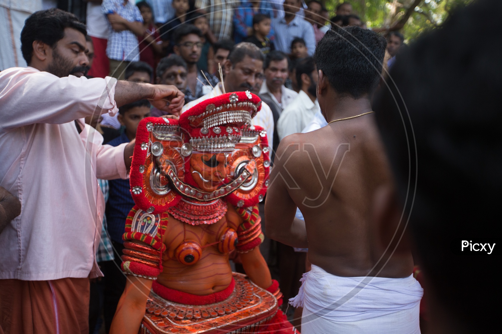 Theyyam Artists  In Makeup For Performance , A  Ritualistic Dance Art Form  in Kerala