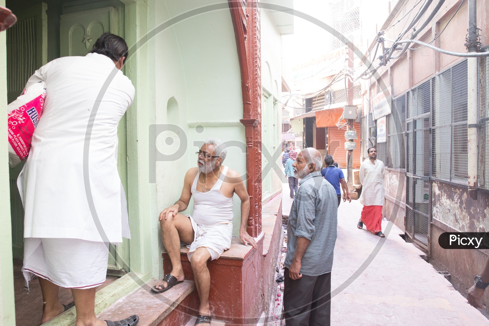Local men in the streets of Nandgaon