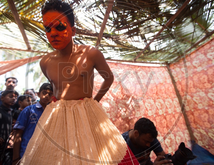Theyyam artist getting ready for Theyyam Festival
