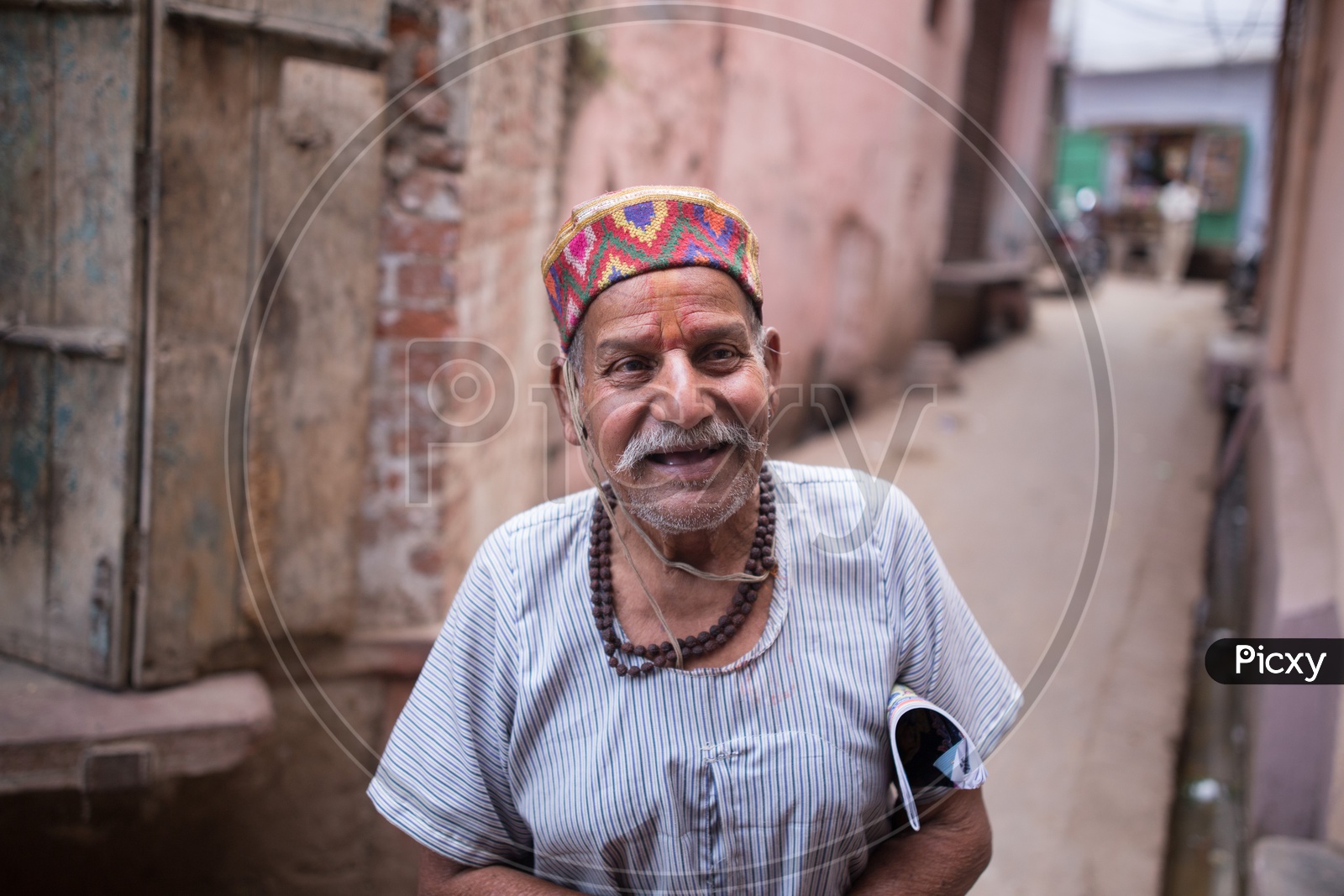 Portrait Of a Old Man In Local Attire In Barsana Streets