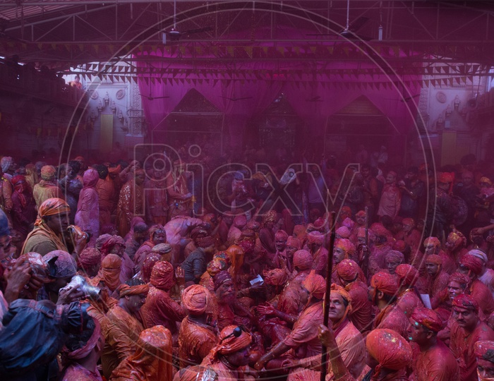 Local People In Barsana Celebrating The  Lathmar Holi Festival