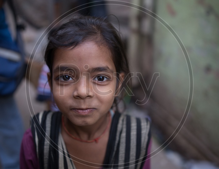 Portrait Of Young Indian Child With Smile Face on The Barsana Streets