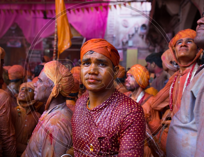 People Filled In Holi Colors Celebrating Holi  in Barsana