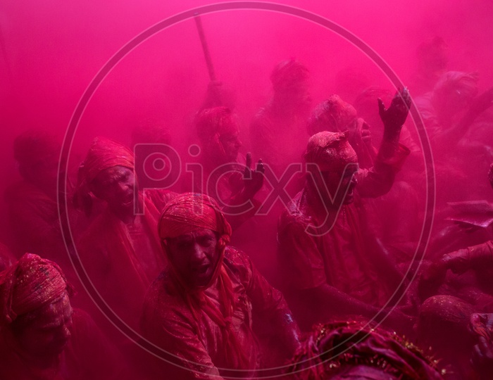 People Filled In Colors Celebrating Lathmar Holi  A Festival Of Colors In Barsana