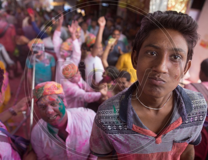 A Local Boy Filled In Holi Colors in Sri Radha Rani  Temple  Celebrating Lathmar Holi