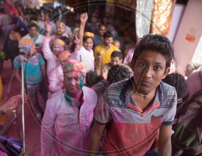 A Local Boy  Filled In Holi Colors in Sri Radha Rani  Temple  Celebrating Lathmar Holi