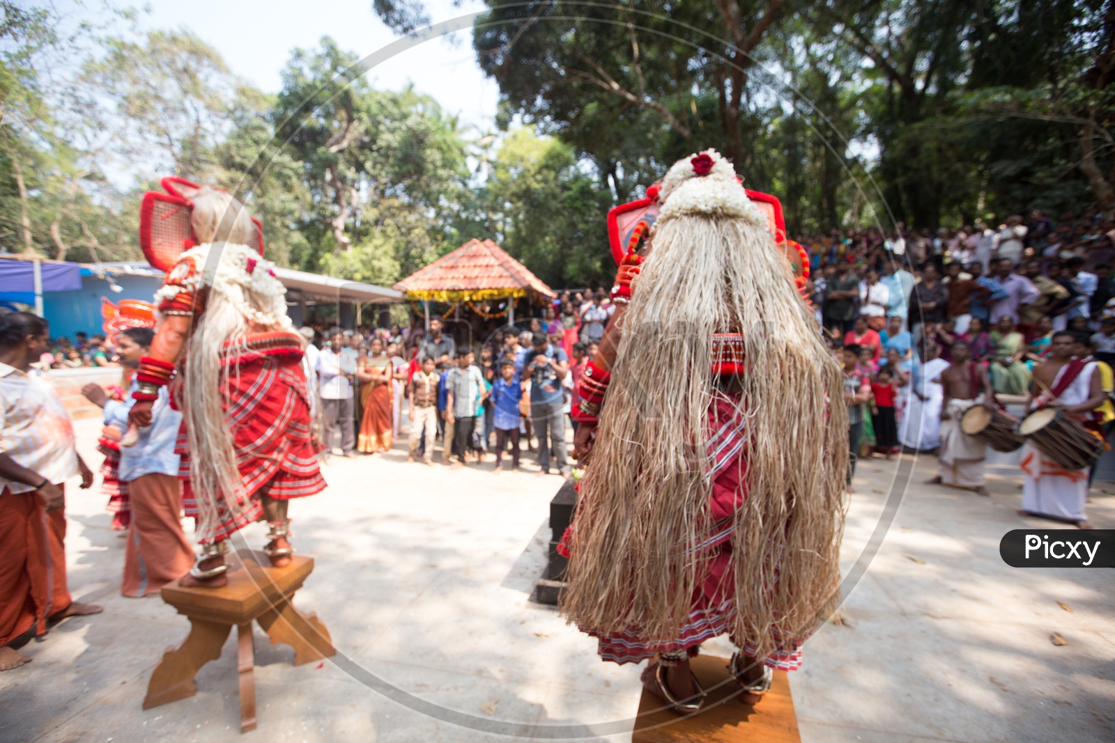 Artists during the performance of Theyyam