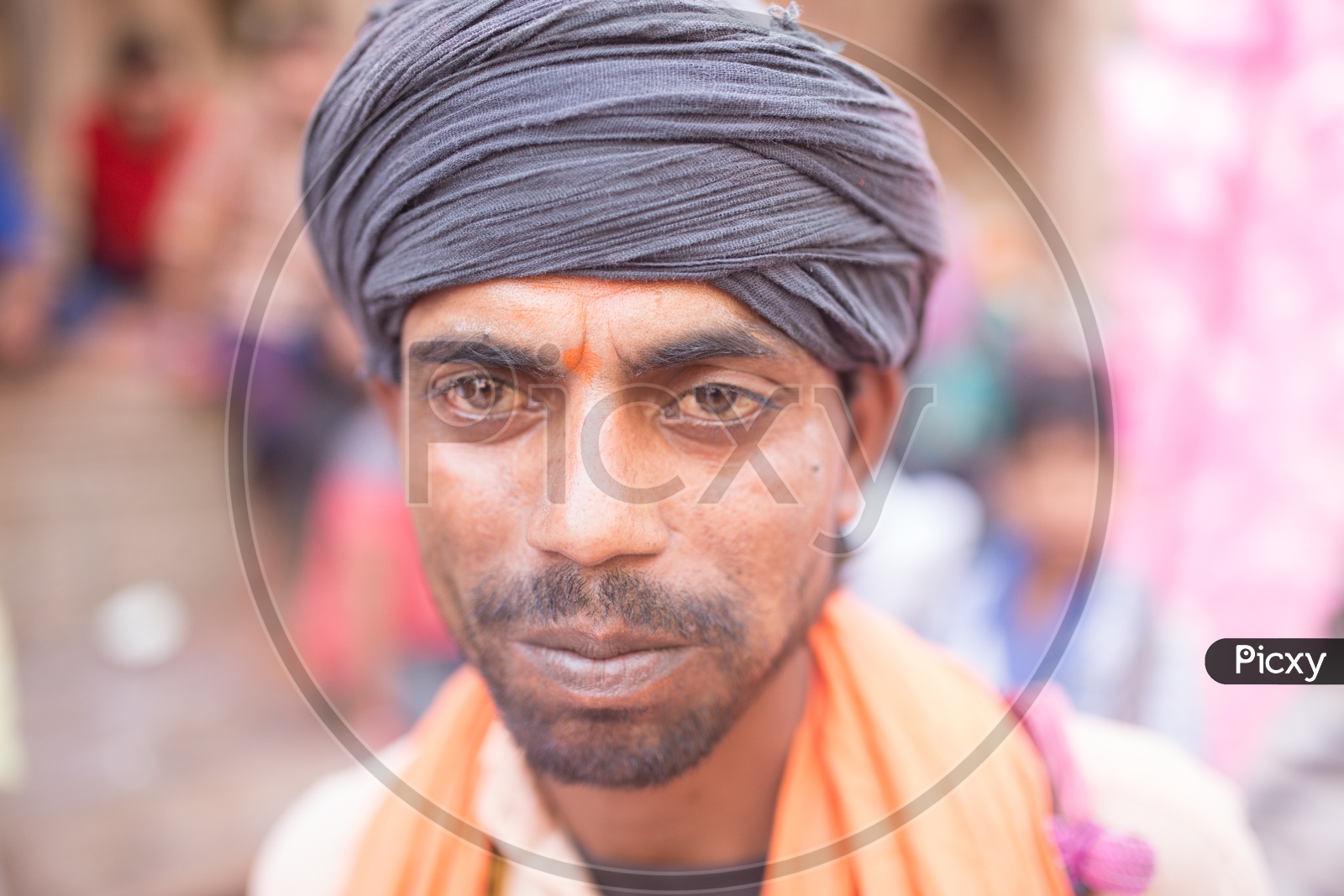 Portrait of an Indian man with black turban