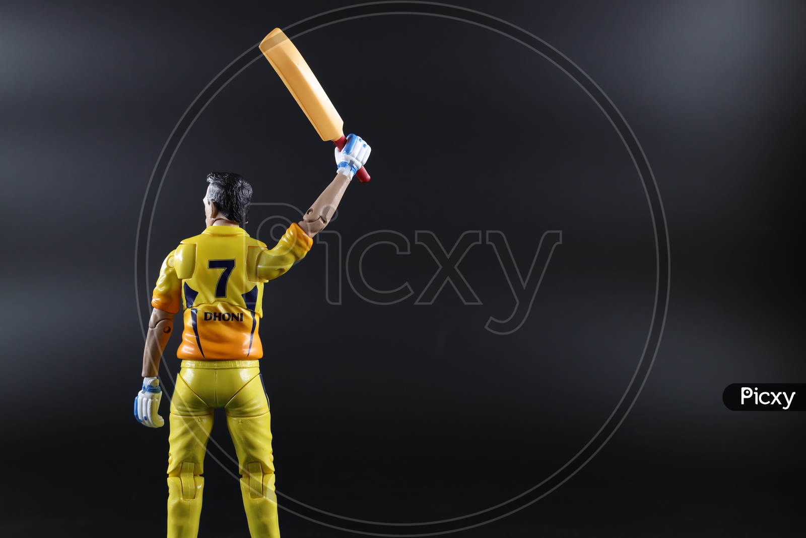 MS Dhoni  in CSK Jersey  Action Figure  or Toy  On an Isolated Black Background